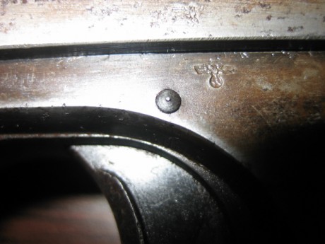 Hola. Vendo FN 1922, calibre 7.65 (32 Acp) en libro de coleccionista. Con marcajes alemanes en armazón 30