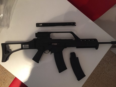 Buenas compañeros foreros!

Pongo en venta mi ruger 10/22 con kit arcangel del G36, con dos cargadores 02
