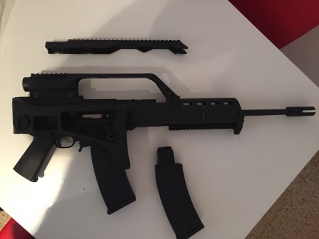 Buenas compañeros foreros!

Pongo en venta mi ruger 10/22 con kit arcangel del G36, con dos cargadores 01