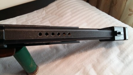 Lo dicho que vendo mi Pistola HAMMERLI, de calibre 22 corto, como se puede ver en las fotos esta practicamente 10