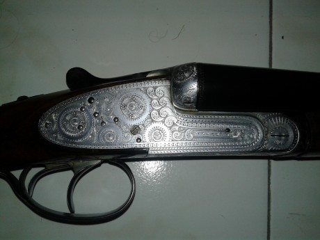 Se vende preciosa escopeta plana (paralela) con dos juegos de cañones. Marca LAURONA. Gama alta, lagrima, 12