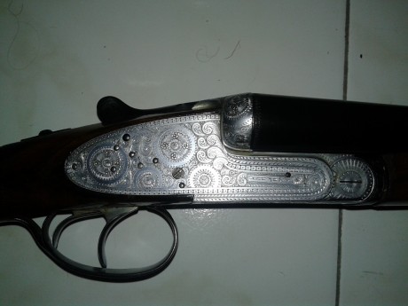 Se vende preciosa escopeta plana (paralela) con dos juegos de cañones. Marca LAURONA. Gama alta, lagrima, 11