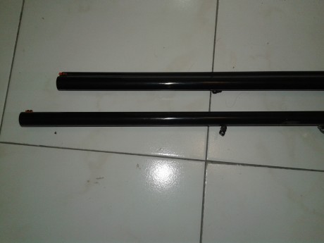 Se vende preciosa escopeta plana (paralela) con dos juegos de cañones. Marca LAURONA. Gama alta, lagrima, 21