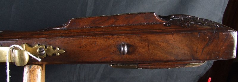 Hola, voy a intentar poner unas fotos de este arma que he encontrado mirando por la web. Es un rifle rapido 80