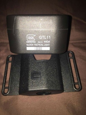 linterna glock gtl 11 mas funda portalinterna glock mas 6 pilas duracell crt 123 y bombilla extra. 105e
se 01