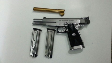 Se vende por no usar esta preparada para precisión tiene dos cañones de el 9mm uno creo nitrurado la pistola 01