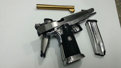 Se vende por no usar esta preparada para precisión tiene dos cañones de el 9mm uno creo nitrurado la pistola 00