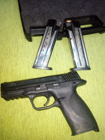 Vendo preciosa pistola smith&wesson mp9, esta como nueva, muy pocos disparos. Súper cómoda de empuñar, 02