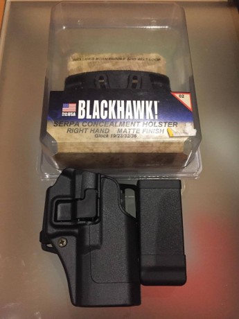 nueva a estrenar con todos sus accesorios funda SERPPA marca Blackhawk y portacargador simple marca blackhawk. 00