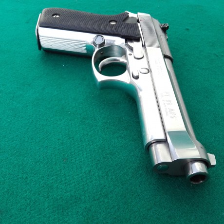 Vendo pistola Taurus mod. 99 AFS en acero inox. en excelente estado, con disparador afinado por armero 01