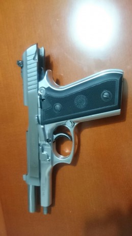 Vendo Pistola Taurus PT99 AFS inox, 9 mm Pb, con maletin de combinacion, dos cargadores, instrucciones. 00