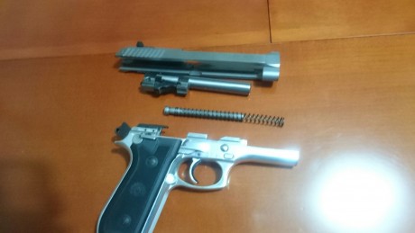 Vendo Pistola Taurus PT99 AFS inox, 9 mm Pb, con maletin de combinacion, dos cargadores, instrucciones. 10