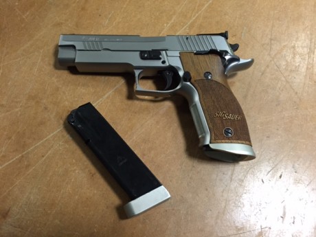 Vendo estas pistolas por no usar:

Una Smith & Wesson modelo 1911 del performance centre en acabado 01