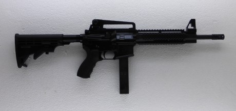 Hola, estoy pensando en comprar un rifle AR-15 pero en calibre 9mm. Lo que me atrae de él suelo tirar 00