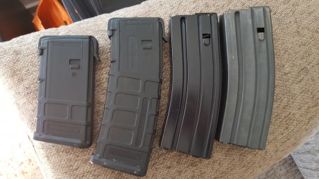 trata de cuatro cargadores muy muy poco usados puesto que la galería de tiro más cercana para rifle y 01