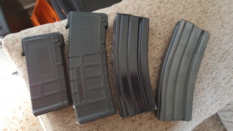 trata de cuatro cargadores muy muy poco usados puesto que la galería de tiro más cercana para rifle y 00