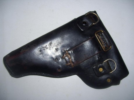 Vendo funda muy usada de la Guardia Civil para la pistola Star BM ,
 cuero muy usado , trabilla de amarre 02