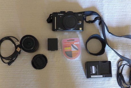 Cambio cámara Lumix GF1 con todos sus accesorios por revolver de avancarga Colt Navy .36. También podríamos 02
