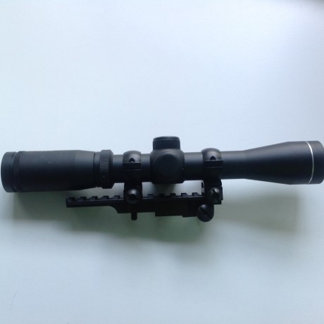 VENDIDO SE PUEDE CERRAR  un visor NcStar 2-7x32 gran distancia al ojo con retícula iluminada y un carril 00
