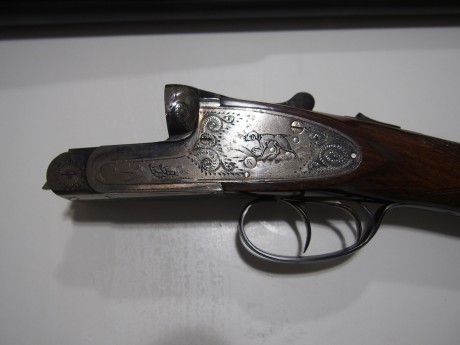 Vendo escopeta paralela marca EGO calibre 12 3 y 1 estrellas expulsora, cañones a espejo etc esta nueva. 01