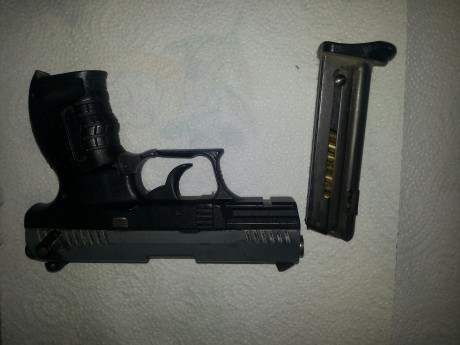 un compañero que se jubila  vende su walther p22 con sus 2 cargadores la cual la compro nueva...tiene 00