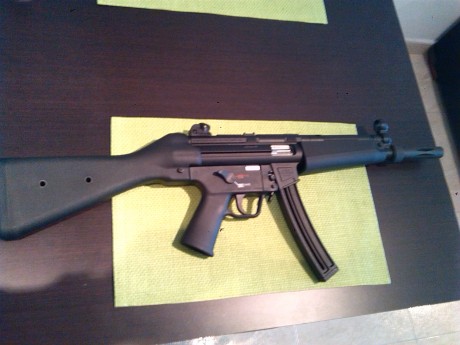 : vendo carabina HK MP5 A ESTRENAR ya que solo tire 4 cajas de municion el dia que la estrene y no la 00