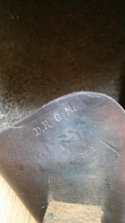Funda original para la walther ppk marcada con D.R.G.M y RZM en su interior, aparte tiene el aguila nazi 00