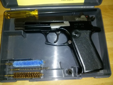 Pistola Star 28PK. Impresionante estado, en su caja original con marcajes del Cuerpo Superior de Policía, 01