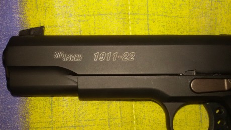 Vendo pistola SigSauer 1911 calibre 22. Prácticamente sin uso, habrá disparado máximo 30-40 cartuchos. 30
