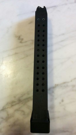 Vendo un cargador marca Promag con capacidad de 32 cartuchos 9mmP NUEVO( SIN ESTRENAR) para pistolas Glock 01