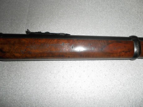 vendo carabina de palanca marlin  modelo 39 , cal 22lr funciona perfecta algo de desgaste en las maderas 11