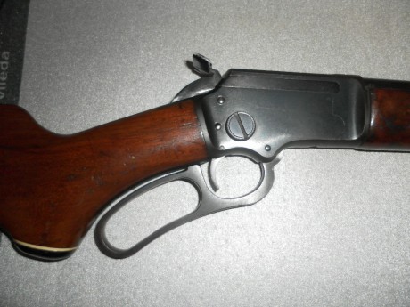 vendo carabina de palanca marlin  modelo 39 , cal 22lr funciona perfecta algo de desgaste en las maderas 10