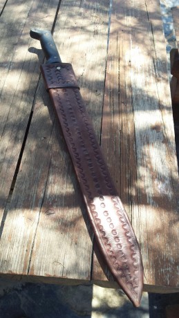Pongo a la venta este machete colombiano totalmente original utilizado para la jungla con su funda trabajada 11