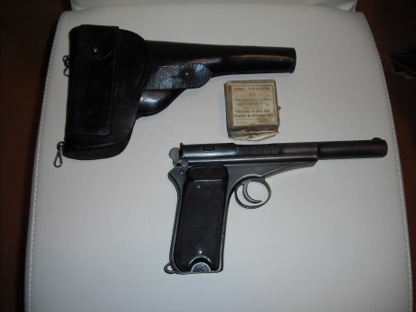 Vendo la pistola campogiro 13/16 que aparece en la fotografía, junto a su funda reglamentaria (baqueta 00
