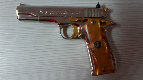 Se vende star s, hecha de encargo, en cromo brillo con los mandos bañados en oro y cachas de nacar, con 02