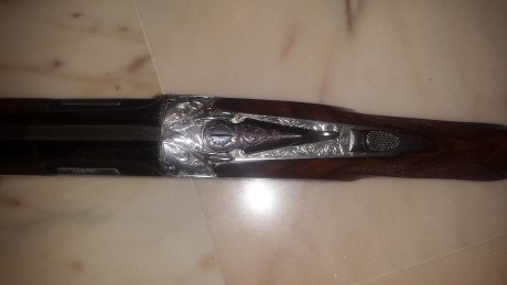 Buenas , vendo una escopeta superpuesta marca Felix Sarasqueta ,falsas pletinas largas con grabados a 01