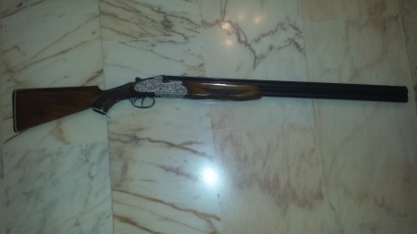 Buenas , vendo una escopeta superpuesta marca Felix Sarasqueta ,falsas pletinas largas con grabados a 00