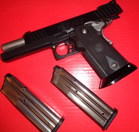  Vendo pistola STI Edge 2011 en 9mm ,  estado impecable , solo ha sido rodada, lleva  solo 2000 disparos 00