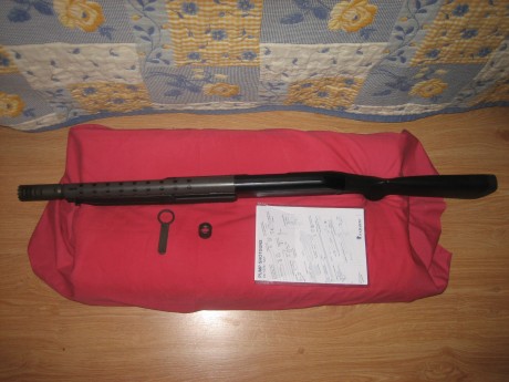 Hola. Vendo esta escopeta de corredera tiene 35cm. de cañón, calibre 12 magnum,. Probada a 1400Kg.con 10