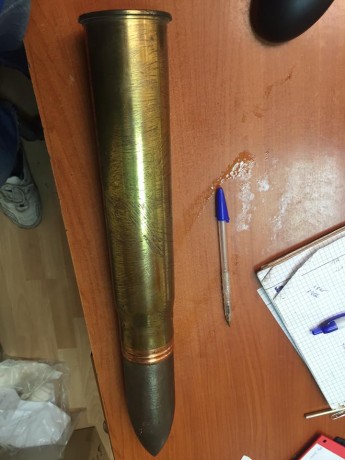Buenas, quisiera me ayudarais a ubicar este proyectil, es un 57 mm pero no encuentro nada sobre él, yo 02