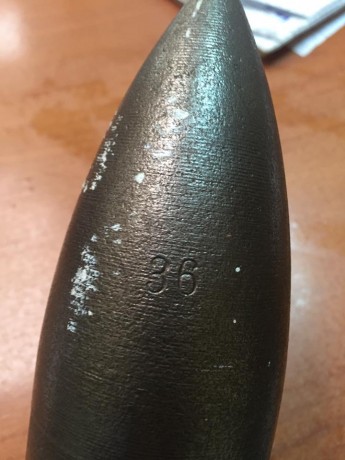 Buenas, quisiera me ayudarais a ubicar este proyectil, es un 57 mm pero no encuentro nada sobre él, yo 01