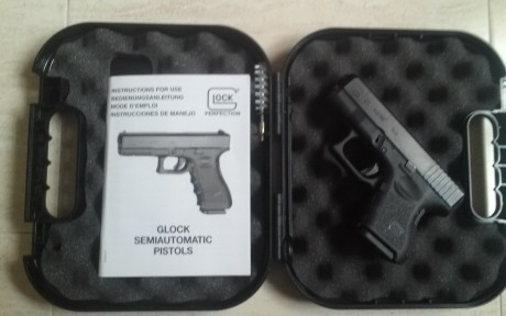 Vendo glock 26 3 generacion, solo 200 disparos, guiada con licencia f, con estuche glock y 1 cargador, 01