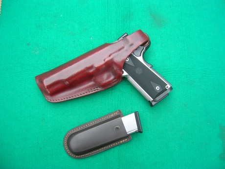 Hola, un amigo vende pistola Smith and Wesson 1911 Pro Series 9 Pb. en impecable estado, con muy pocos 00