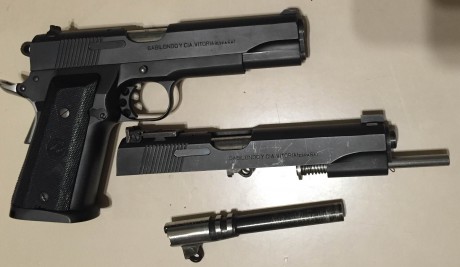 pistola Llama modelo 1911 con dos calibres, 45ACP y 9PB con dos cargadores del 45 y dos del 9 00