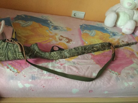hola, acabó de comprar una escopeta semiautomática , ni de las caras ni de las baratas, de polímero, en 30