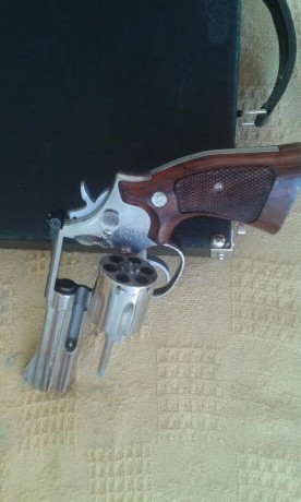 Cambio revolver S&W, calibre 357/38 como nuevo, con dos cachas y maletín por maquina de fotos digital 00