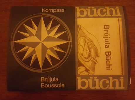 Brújula Suiza marca Büchi, sin estrenar en su caja original con el manual, funda de cuero y varios, dicha 20