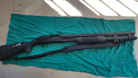 ...para costear otros vicios, se vende mossber modelo 590 con 50 disparos realizados, guiada en E, capacidad 02