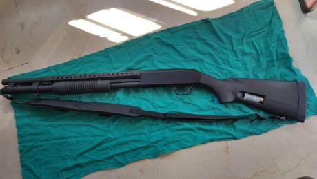 ...para costear otros vicios, se vende mossber modelo 590 con 50 disparos realizados, guiada en E, capacidad 01