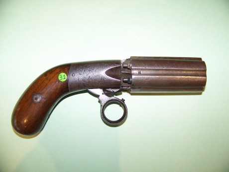 vendo en libro de coleccionista avispero cal 10 mm en perfecto estado fecha aproximada de fabricación 01